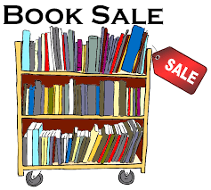 Cart of books that says "Book Sale"