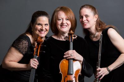 A trio of women with instruments.